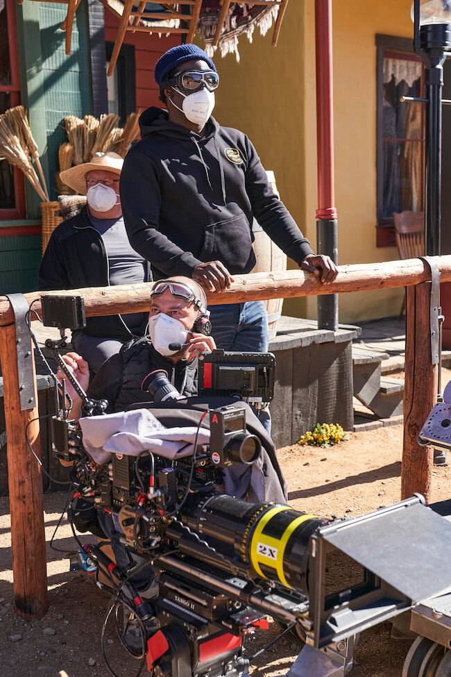 three men in masks on film set