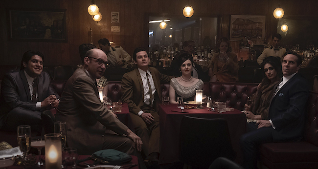 group of people sitting in restaurant